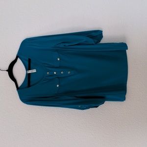 Turquoise top with gold buttons